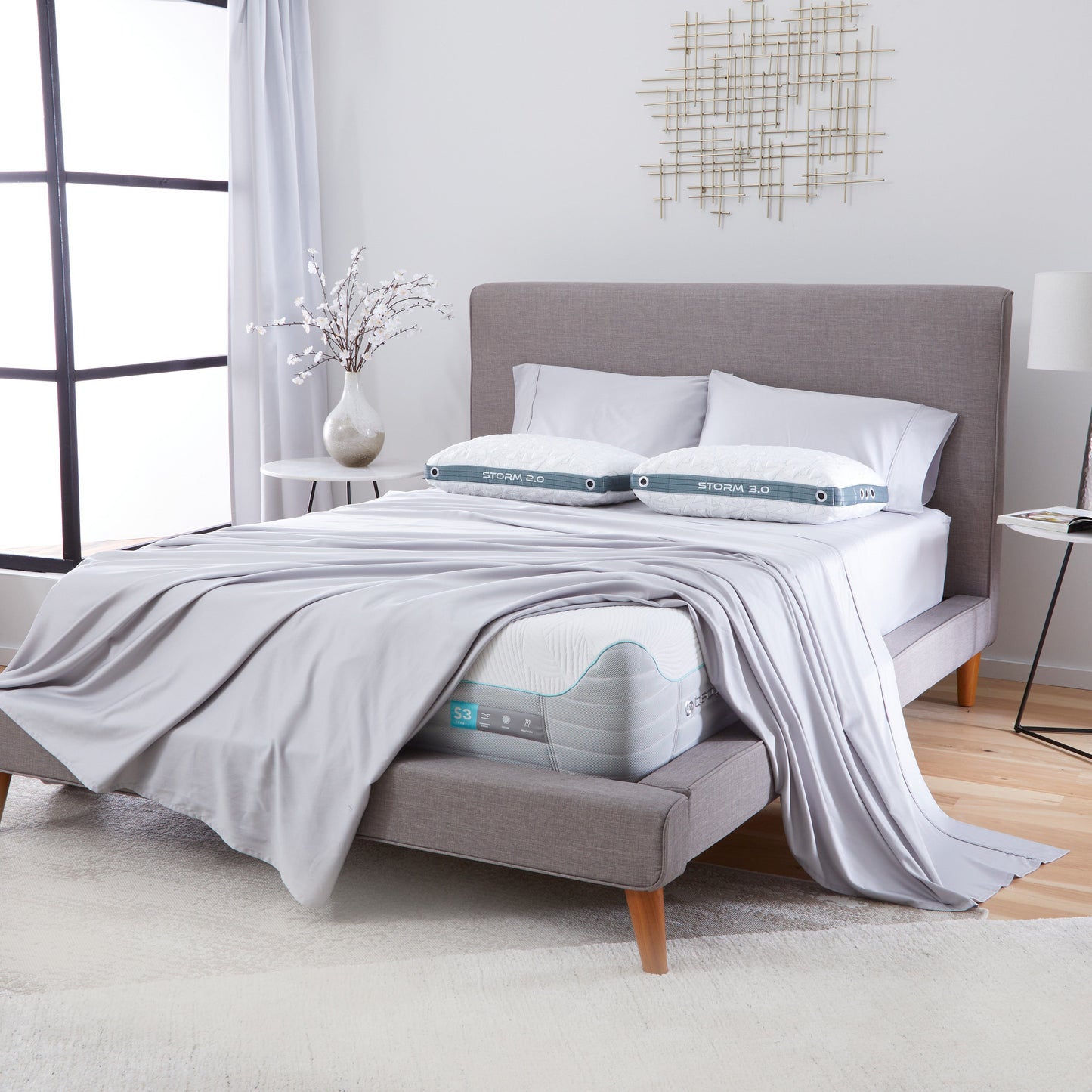 Bedgear S3 II Performance Mattress With sheets and Storm Pillows on top in a bedroom