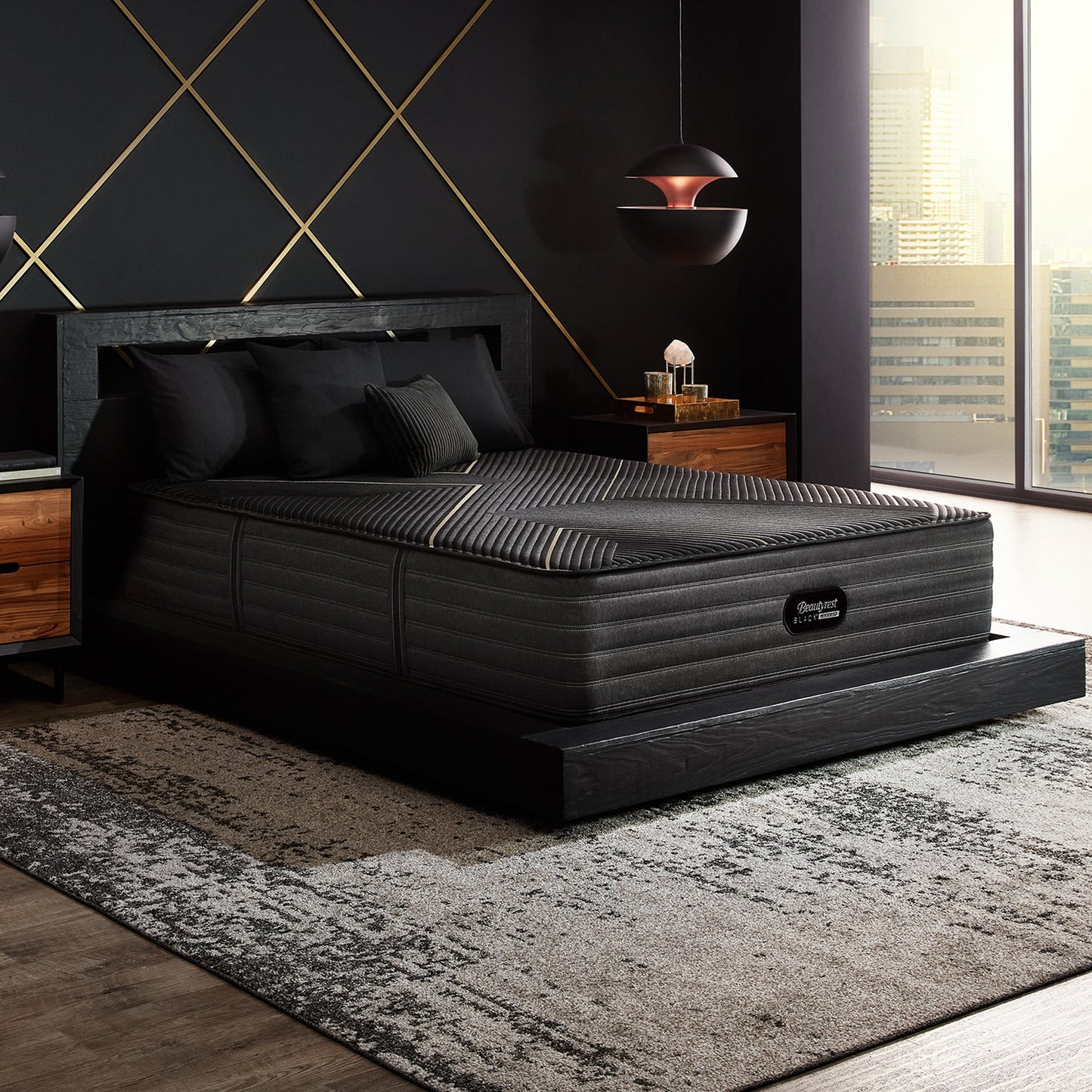 Beautyrest Black Hybrid K-Class Firm Mattress On Bed Frame In Bedroom Angle View