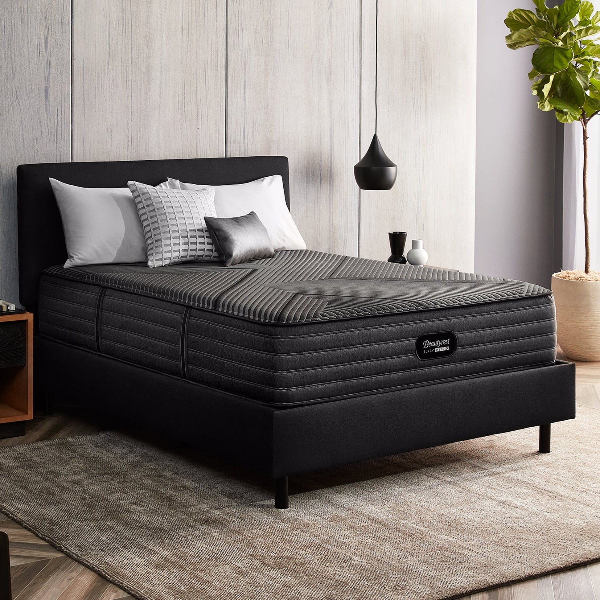 Beautyrest Black Hybrid L-Class Firm Mattress On Bed Frame In Bedroom