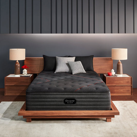 Beautyrest Black C-Class Firm Mattress On Bed Frame In Bedroom Front View