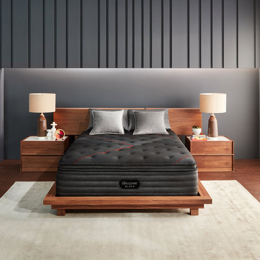 Beautyrest Black C-Class Medium Pillow Top Mattress On Bed Frame In Bedroom Front View
