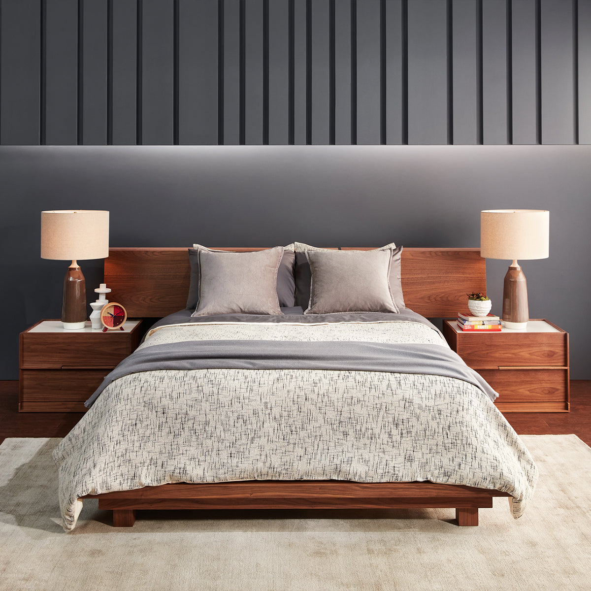 Beautyrest Black C-Class Medium Pillow Top Mattress With Comforter And Pillows In Bedroom