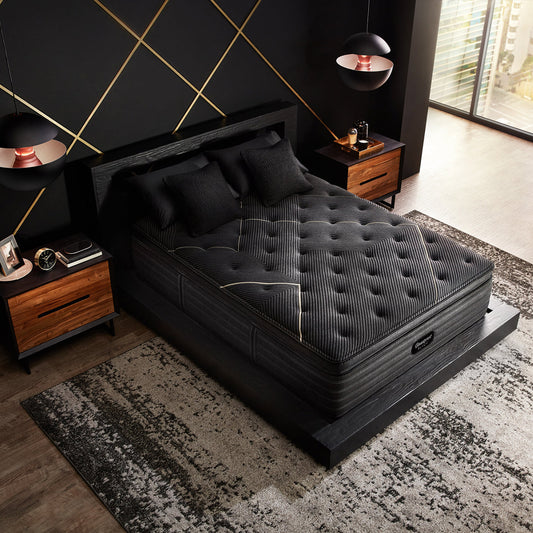 Beautyrest Black K-Class Firm Pillow Top Mattress On Bed Frame In Bedroom Overhead View
