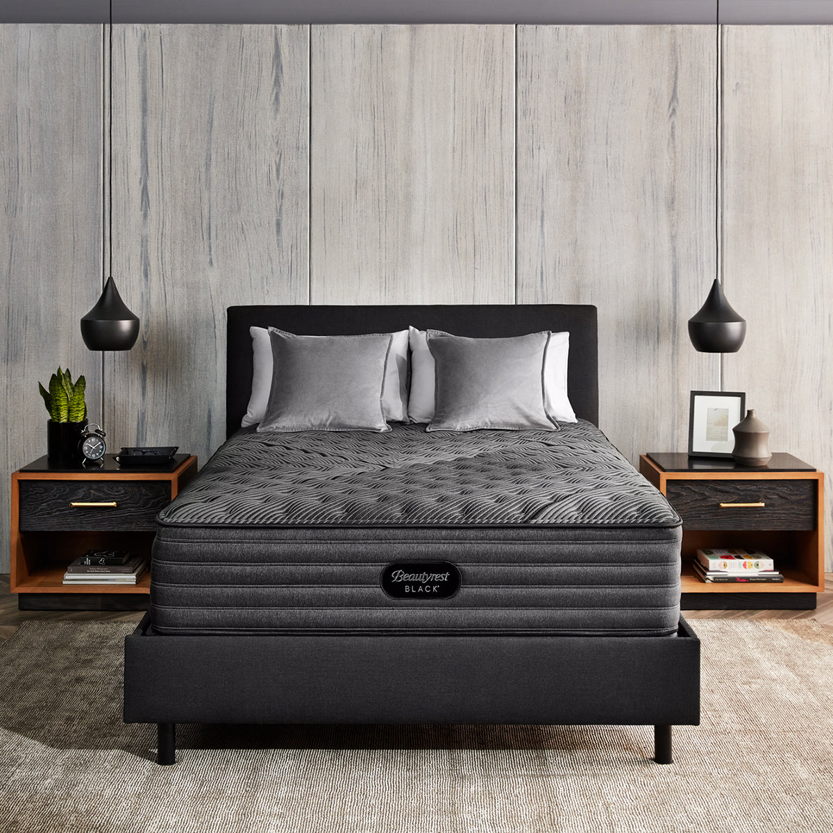 Beautyrest Black K-Class Firm Pillow Top Mattress On Bed Frame With Pillows In Bedroom Front View