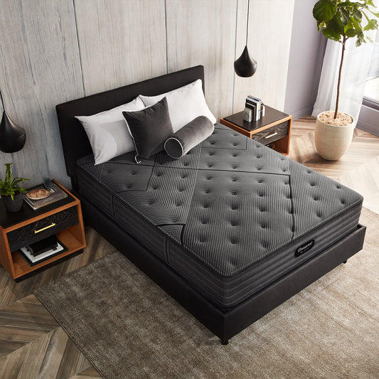 Beautyrest Black L-Class Medium Mattress On Bed Frame WIth Pillows In Bedroom Overhead View