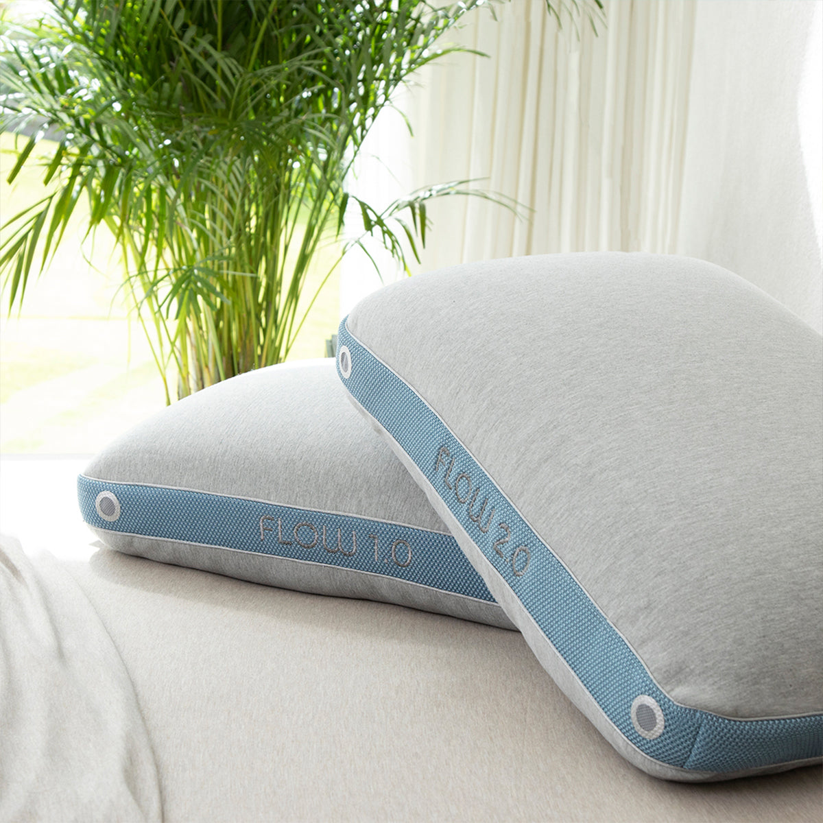 Products Bedgear Flow Performance Pillow 1.0 and 2.0 shown together