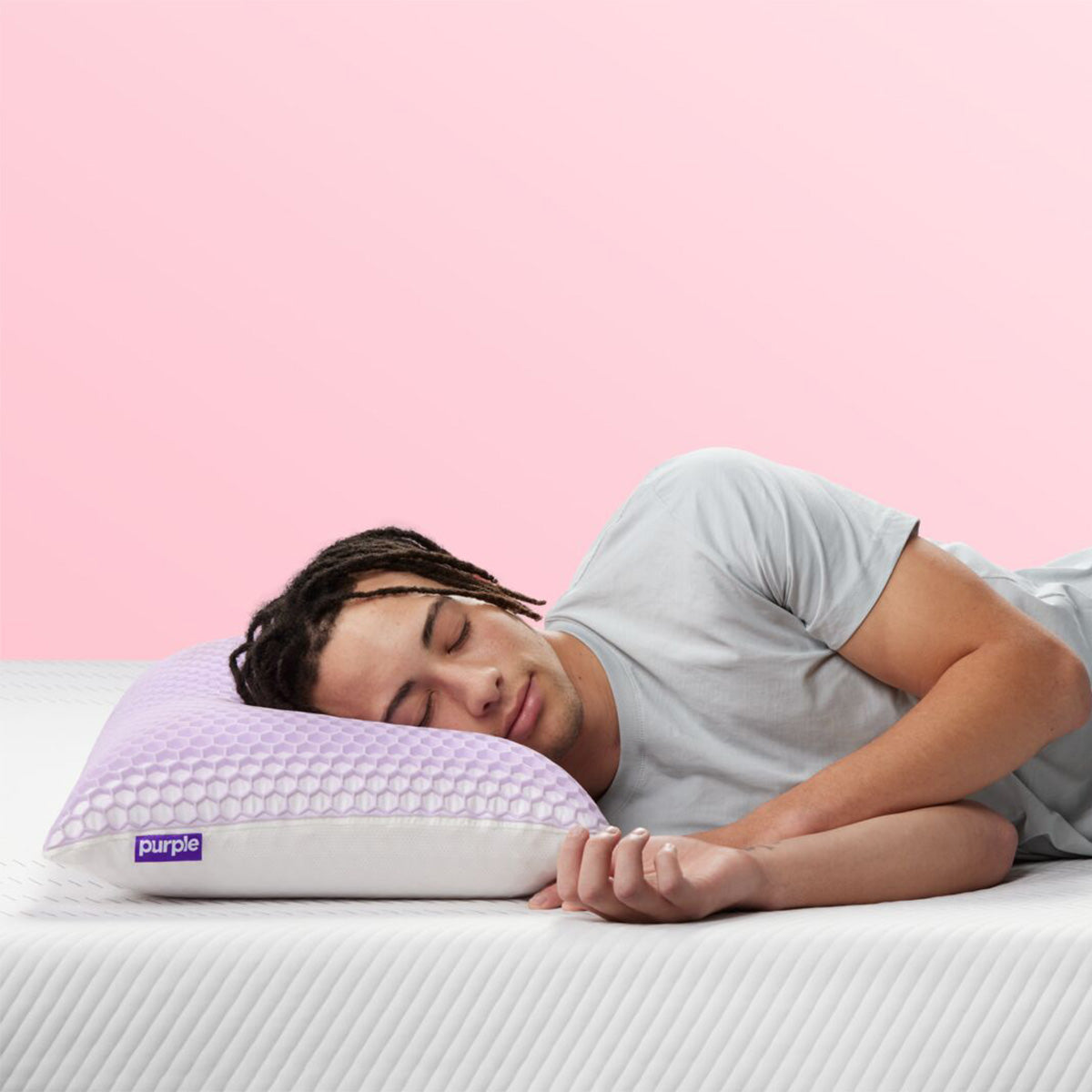 Man Sleeping On Purple Harmony Pillow Uncovered To Show The GelFlex Grid