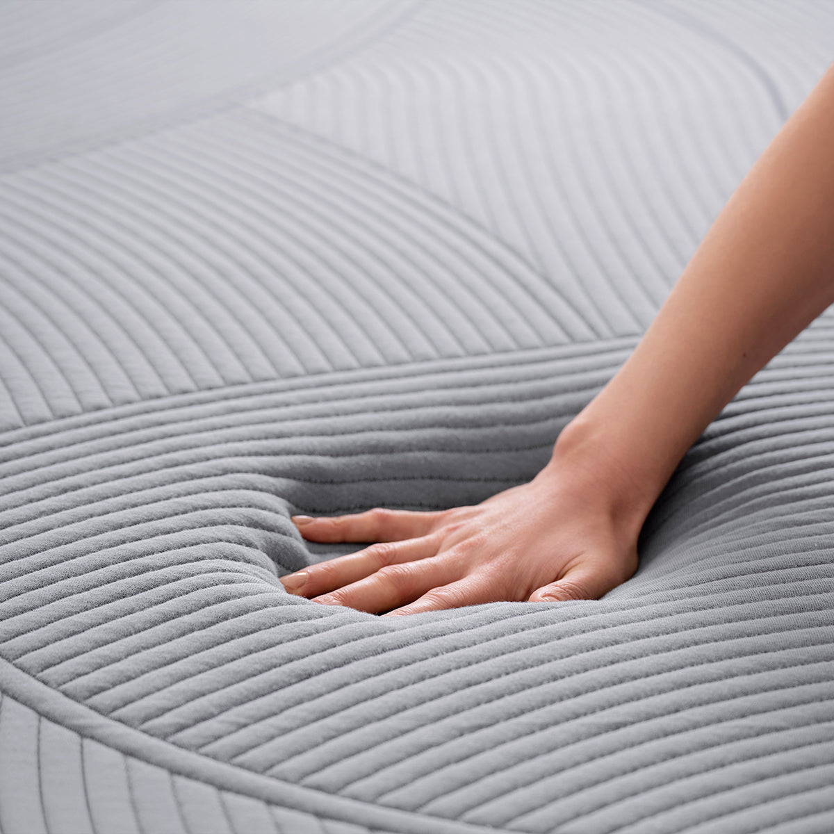 Purple Restore Soft Mattress Hand Pressing On Mattress