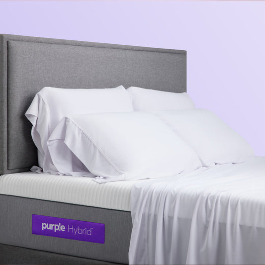 Purple SoftStretch Pillowcases On Pillows On A Purple Mattress