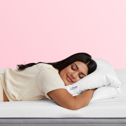 Woman Sleeping On A Purple TwinCloud Pillow