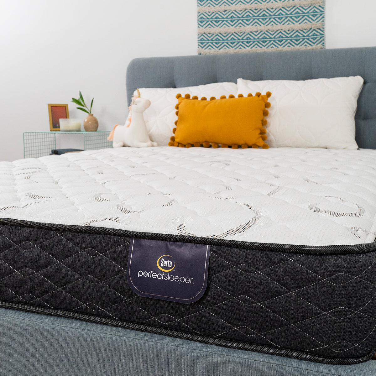 Serta Perfect Sleeper® Reedley Firm Mattress Corner Shot Showing Product Tag Label And Fabric Detail