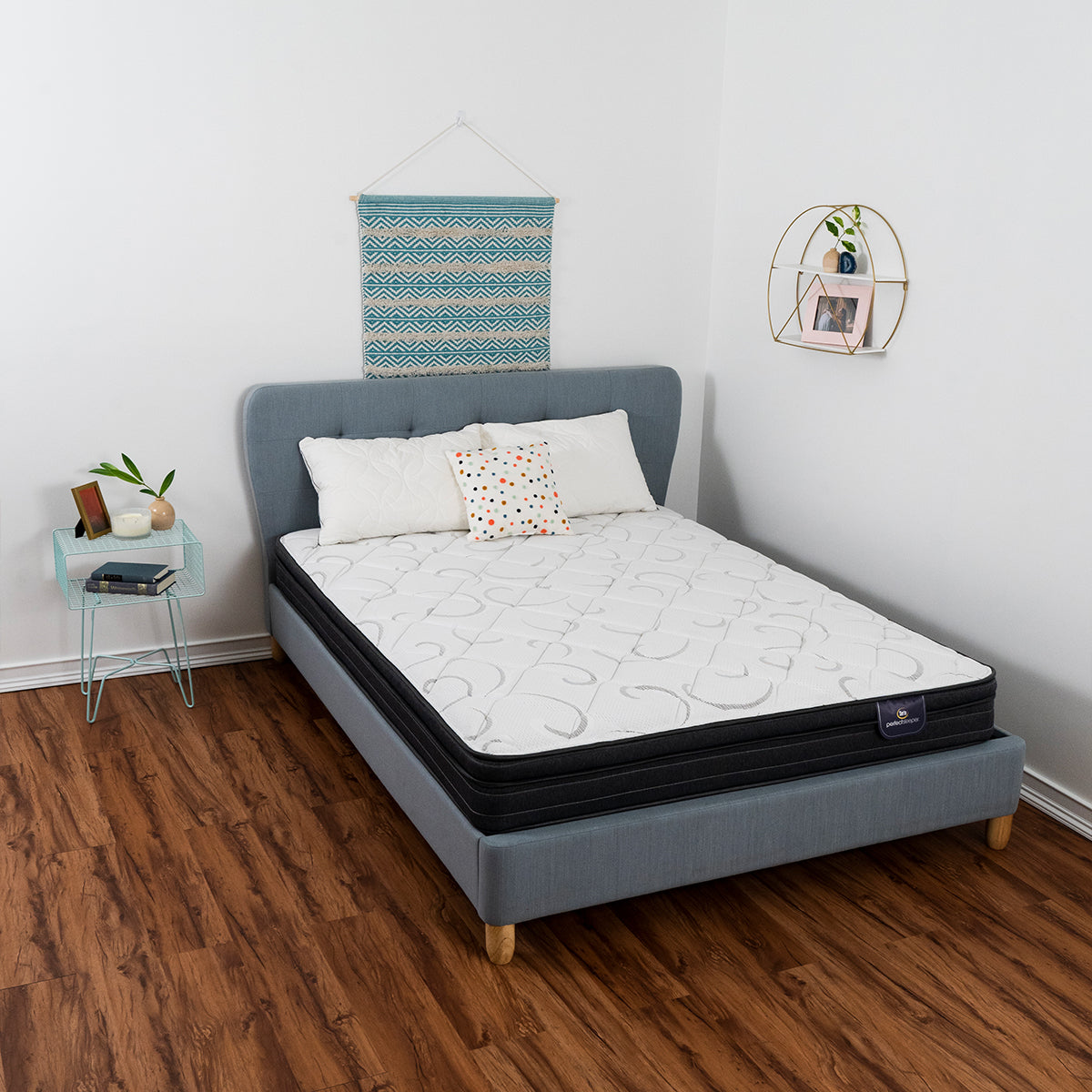 Serta Perfect Sleeper Seabright Euro Top Mattress With Pillows On Bed Frame Overhead View Showing Swirled Pattern Of The Cover Fabric