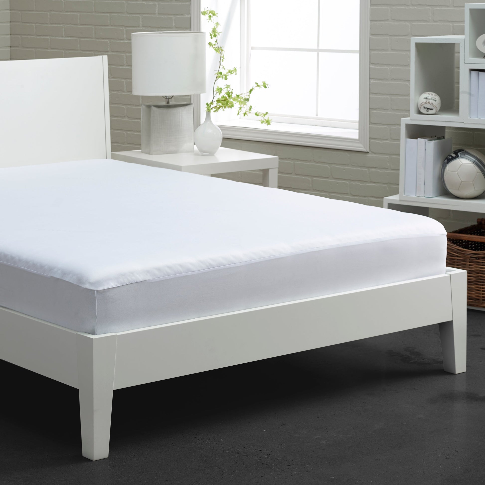 Bedgear StretchWick Mattress Protector shown on bed