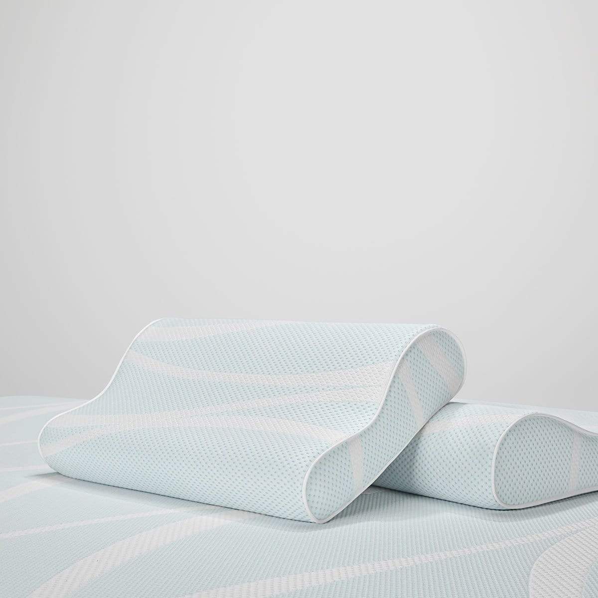 TEMPUR-Breeze Cooling Neck Pillows by TEMPUR-Pedic Side View on a mattress