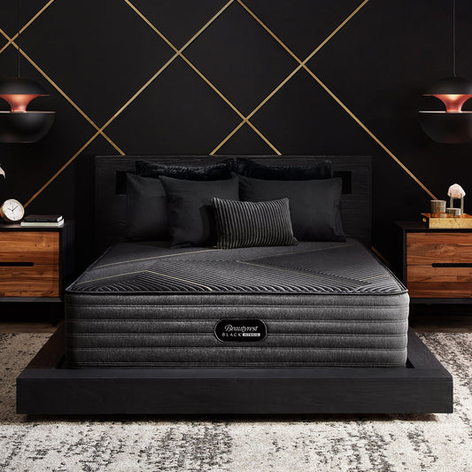 Beautyrest Black Hybrid K-Class Firm Mattress On Bed Frame In Bedroom Front View