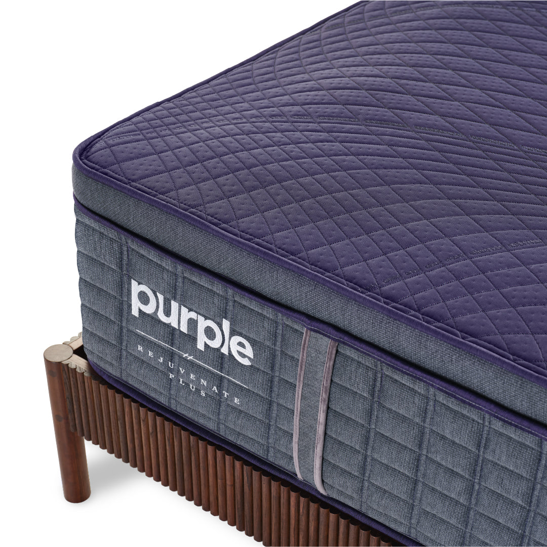 Corner shot image of a Purple Rejuvenate Premier mattress.