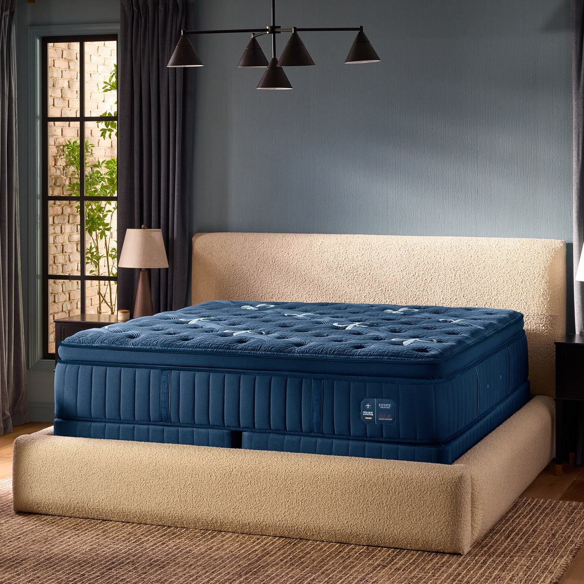 Stearns & Foster Estate Firm Pillow Top Mattress II angled in a bedroom