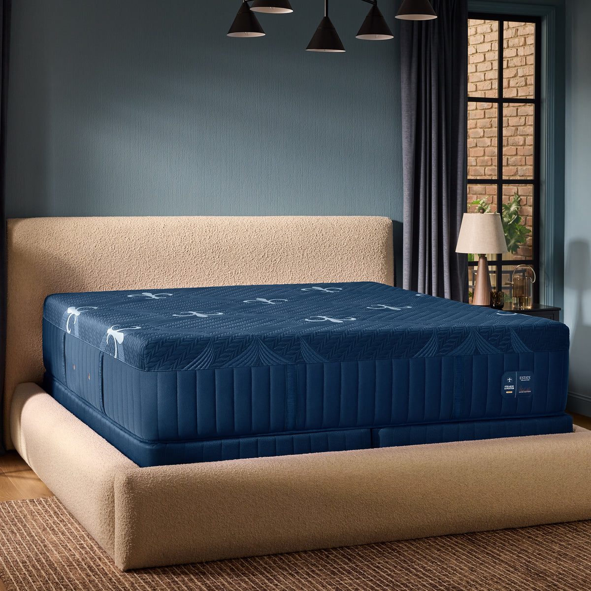 Stearns & Foster Estate Medium Hybrid Mattress II angled in a bedroom