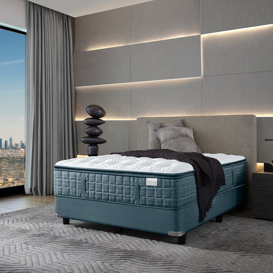 Aireloom Opus Luxury Firm Mattress In A Modern Minimalist Loft Style Apartment Bedroom Overlooking A City