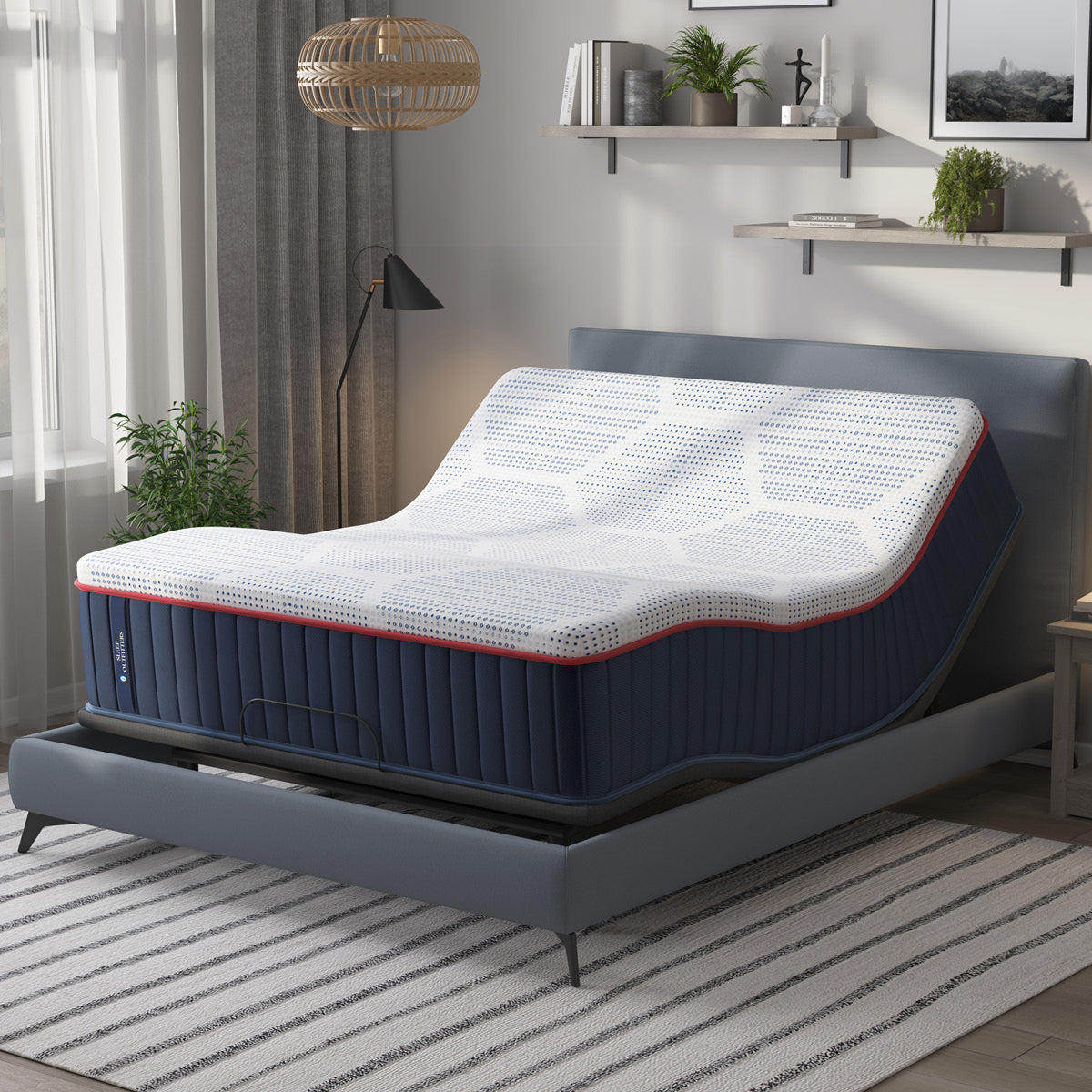 Sealy® Sleep Outfitters Gemini Soft Hybrid Mattress on an adjustable base bedroom image