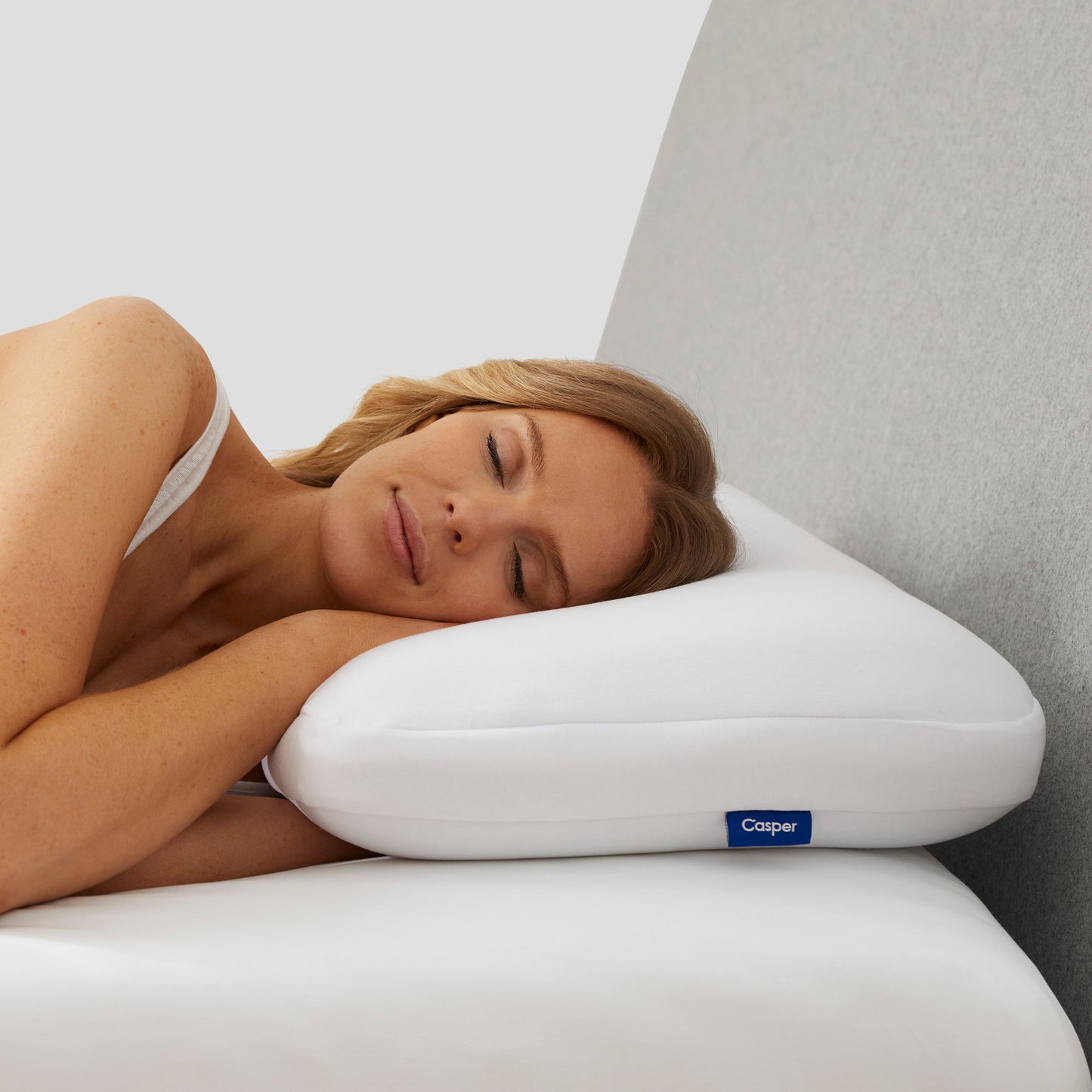 Woman Sleeping On Casper Hybrid Pillow