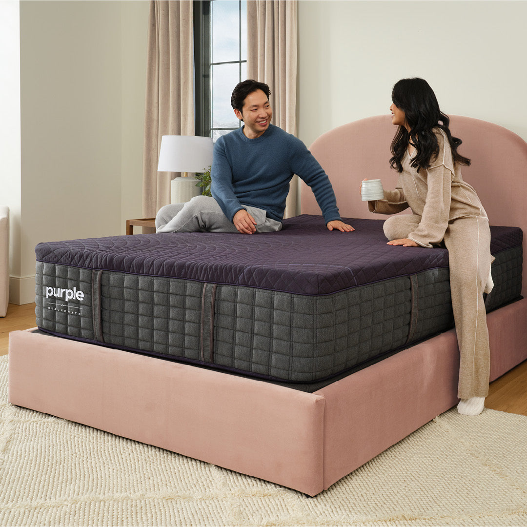 Purple Rejuvenate bedroom lifestyle image with couple.