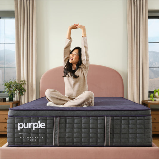 Purple Rejuvenate Plus bedroom lifestyle image with woman.