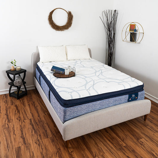 Serta iDirections X5 Hybrid II Plush Pillow Top Mattress On Bed Frame In Bedroom With Pillows and Serving Tray Holding Coffee Mugs and Book