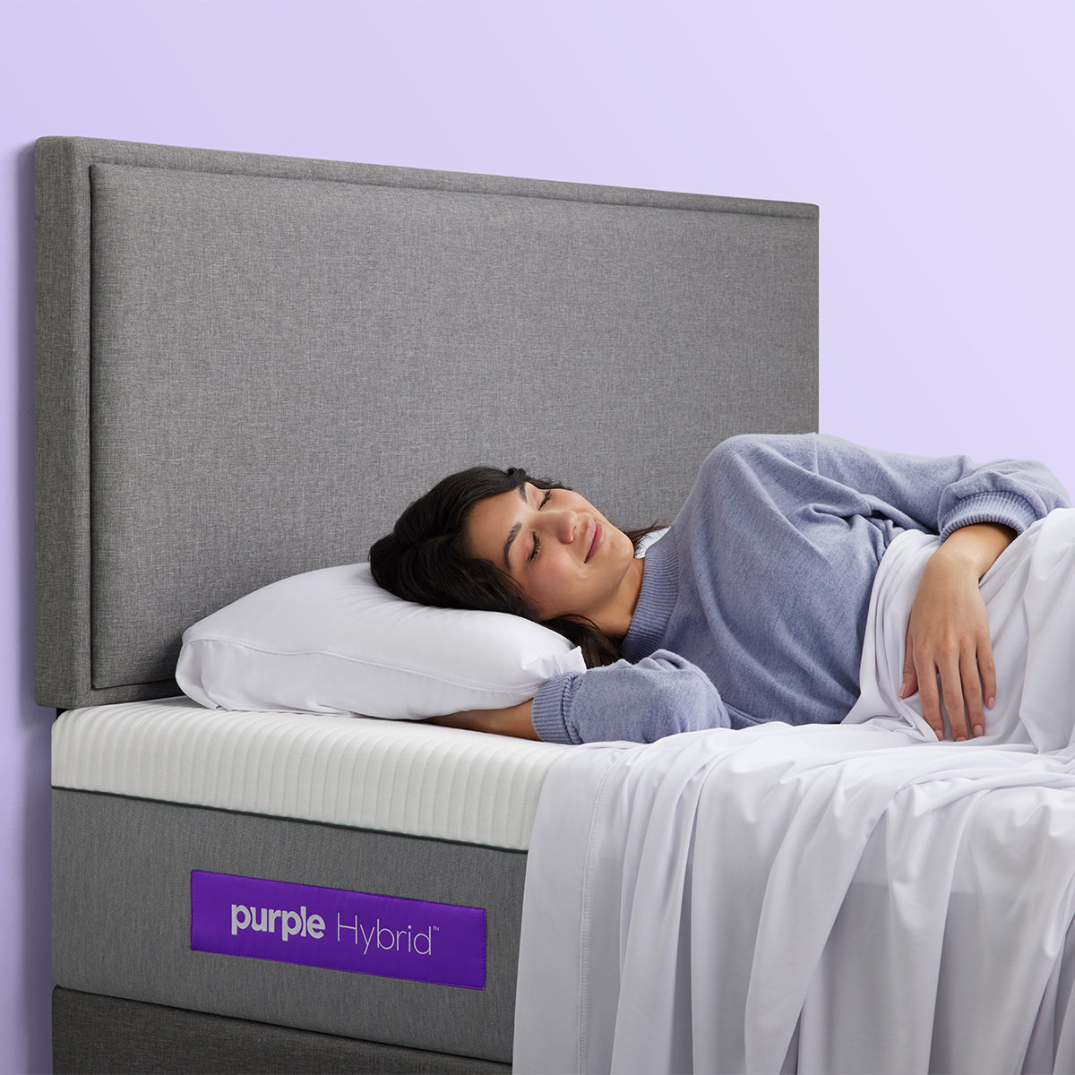 Woman Sleeping On The Purple Hybrid Mattress