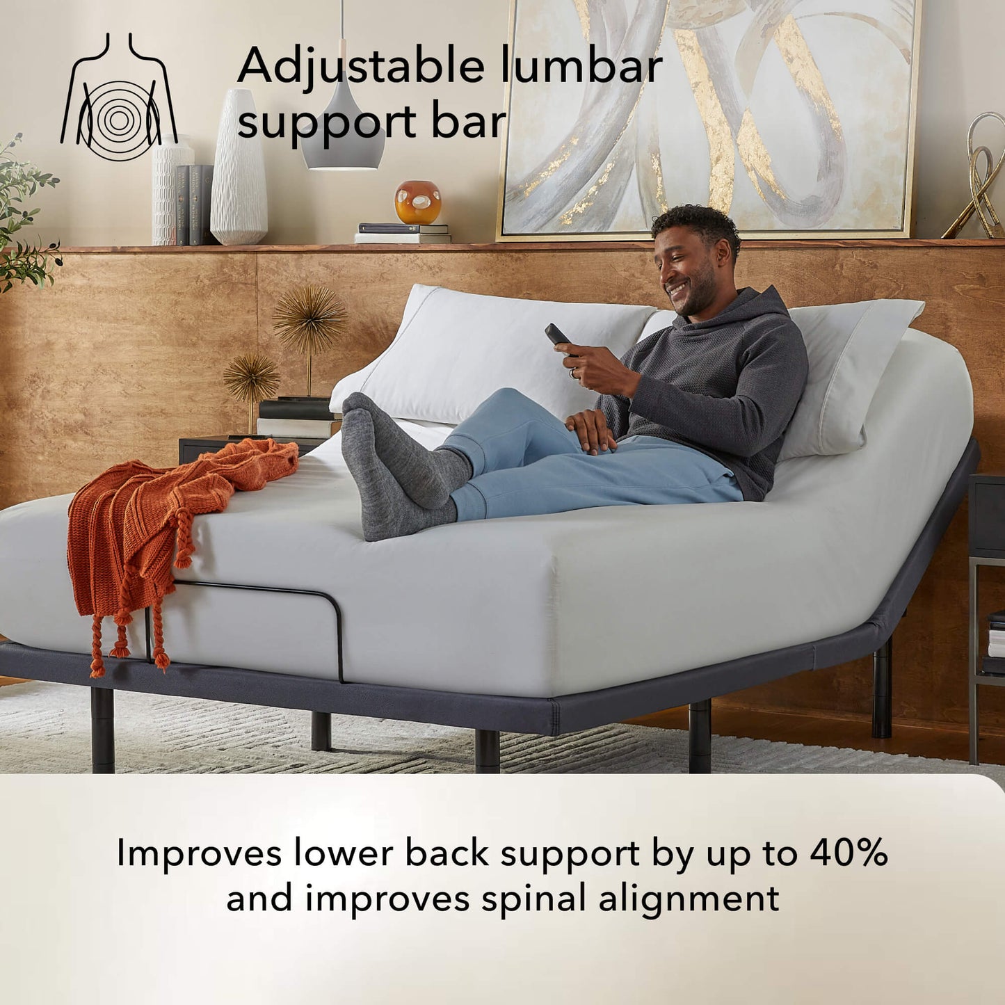 baselogic Pearl Adjustable Bed Base - In room with model adjustable lumbar support feature
